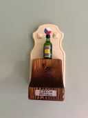 Dekorativní držák s Becherovkou